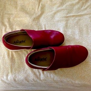 Alegria slip on, with Velcro adjust strap across forefoot